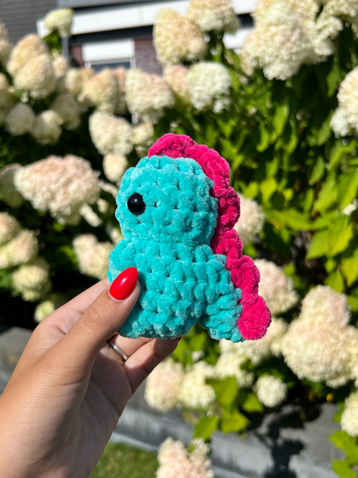 dino blauw met roze