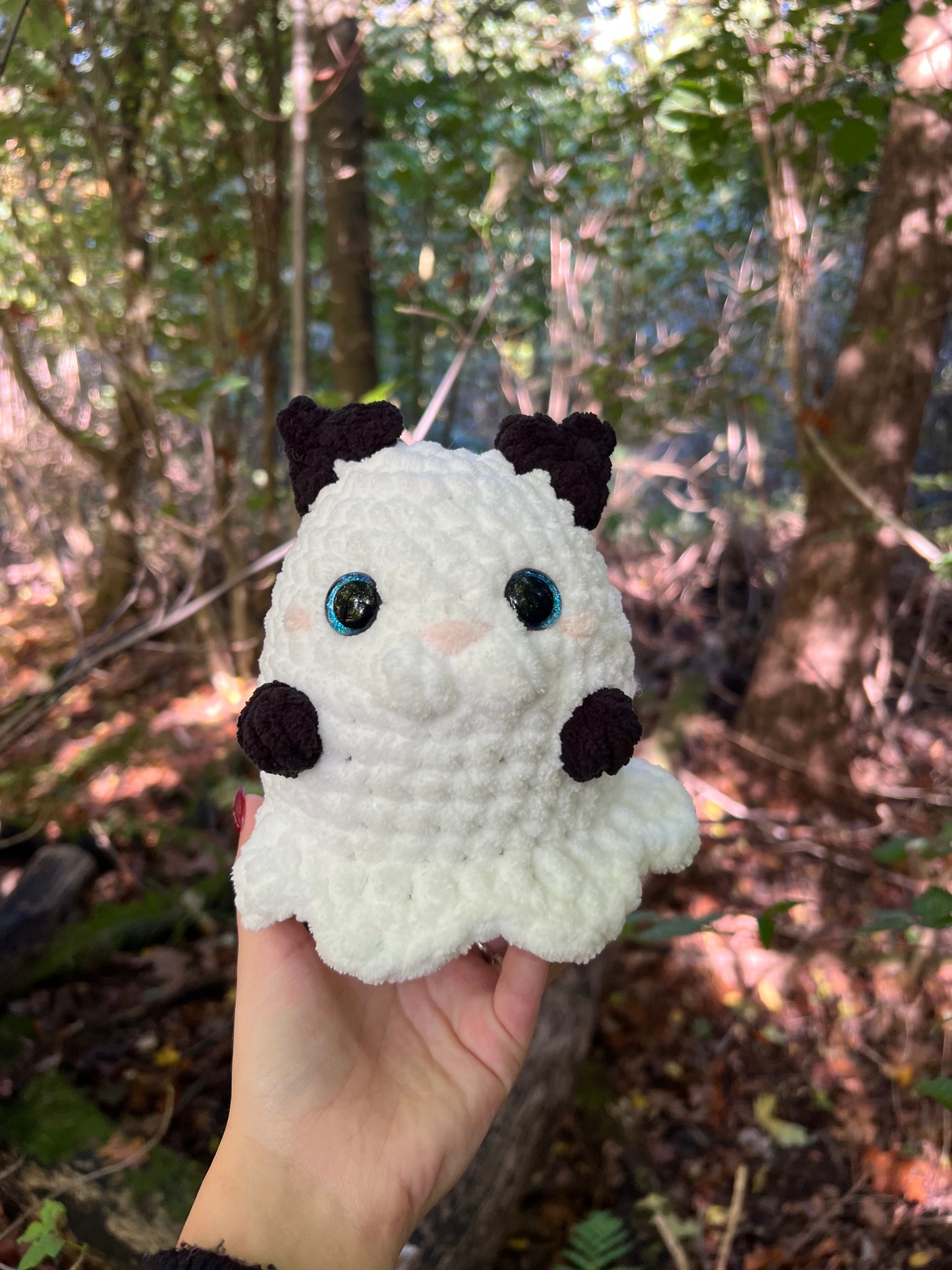 zwarte kat in spook pak